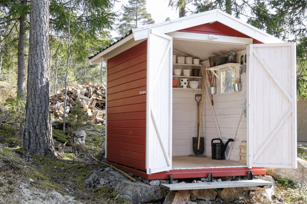 red shed in a backyard