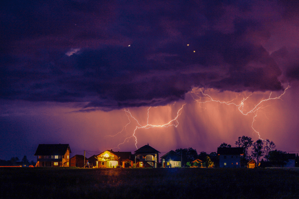 lightning striking a house