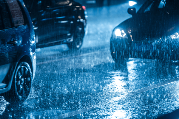 Cars driving on a rainy road