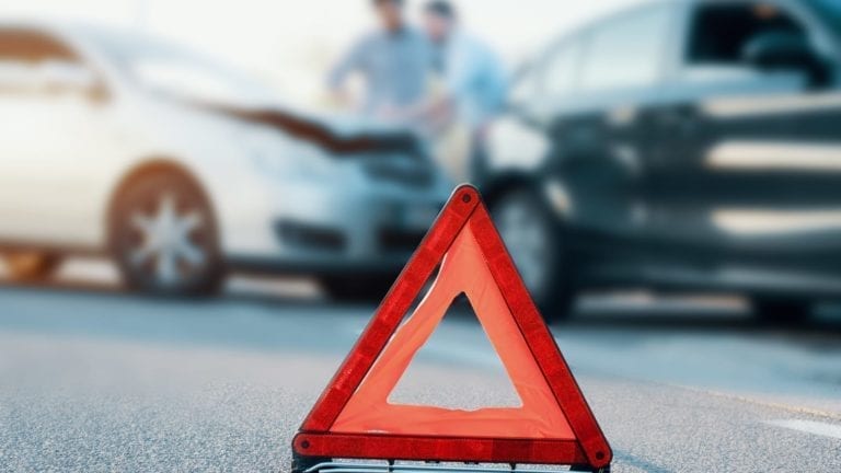 Caution cone set out near a traffic accident