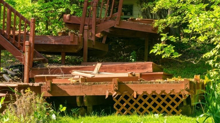 Deck damaged by falling trees
