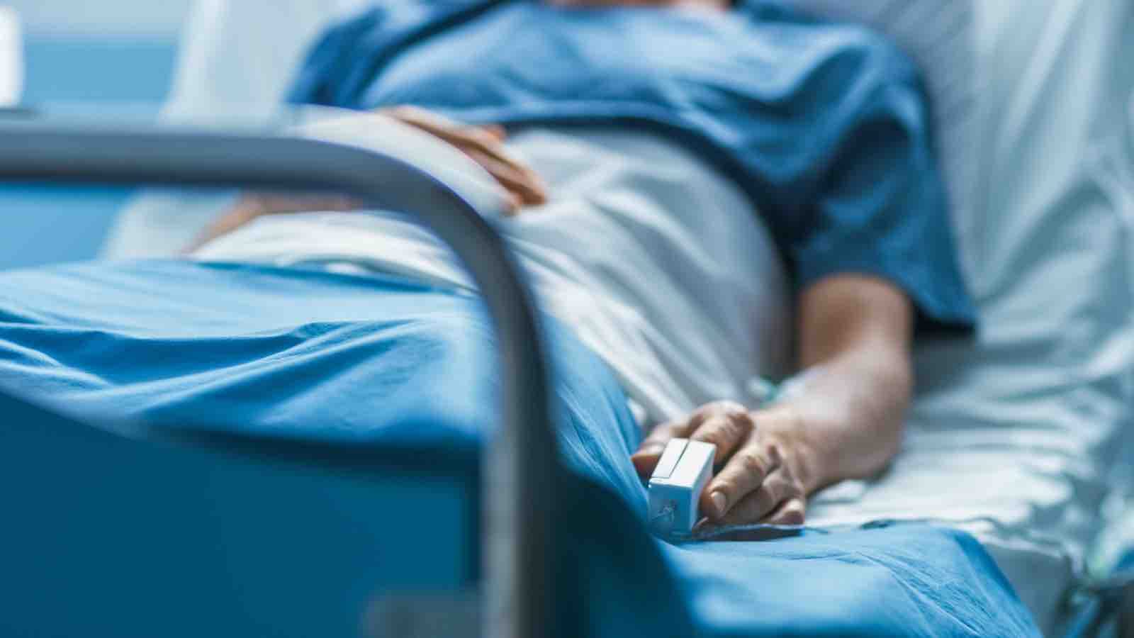 Patient lying in a hospital bed