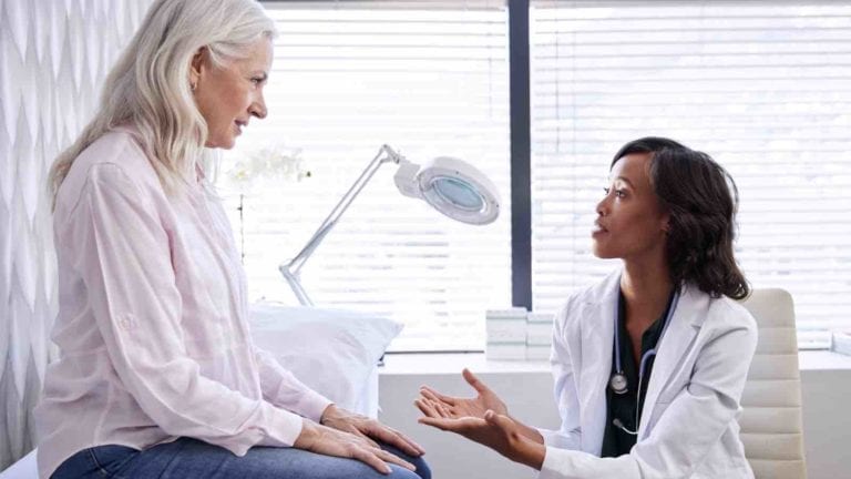 Woman getting a medical exam