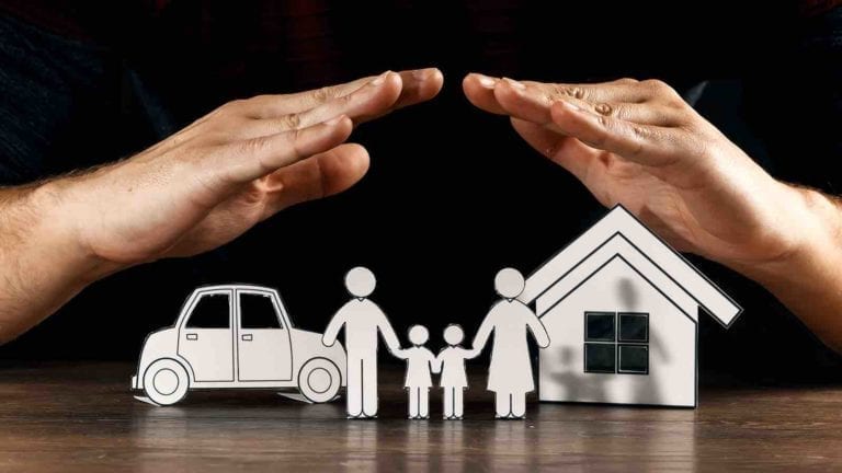 Hands protecting a car, home, and family