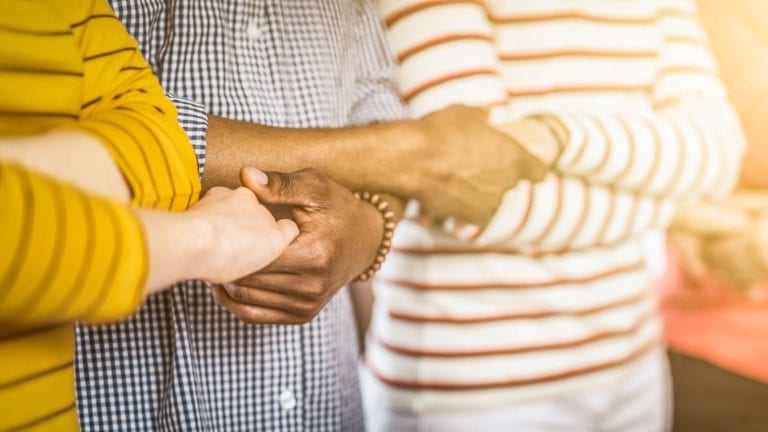 Community Together Holding Hands