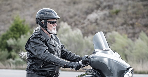 guy_on_a_motorcycle_575x300