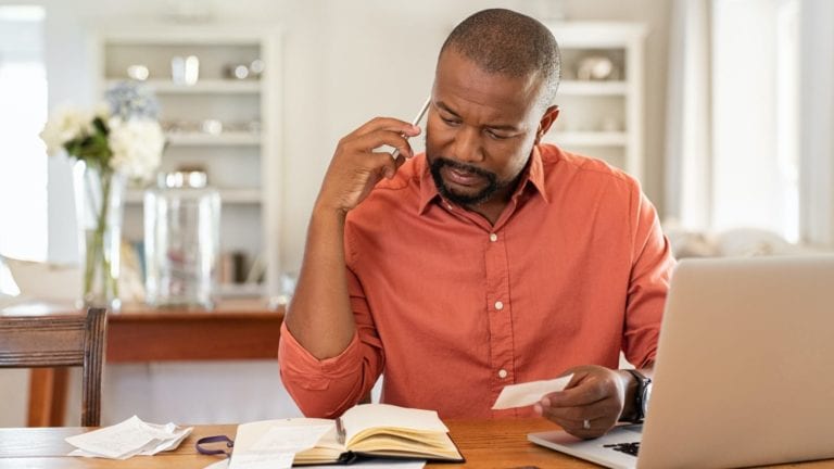 man studying documents