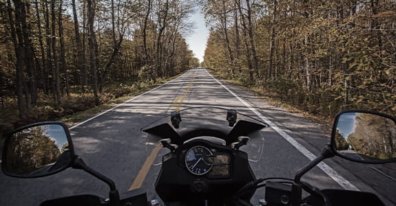 motorcycle_rider_on_the_road_575x300