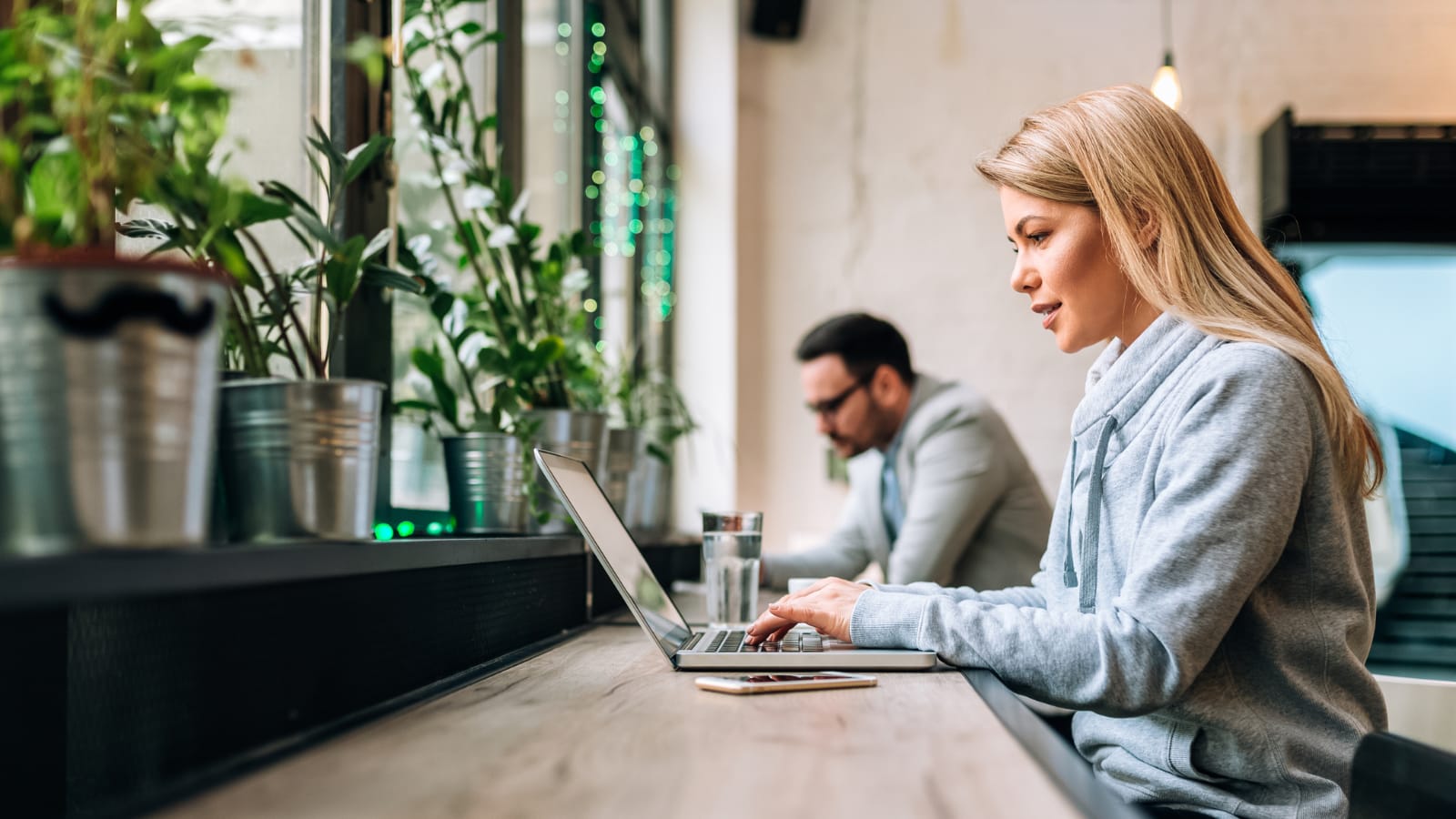 Female freelancer working on laptop