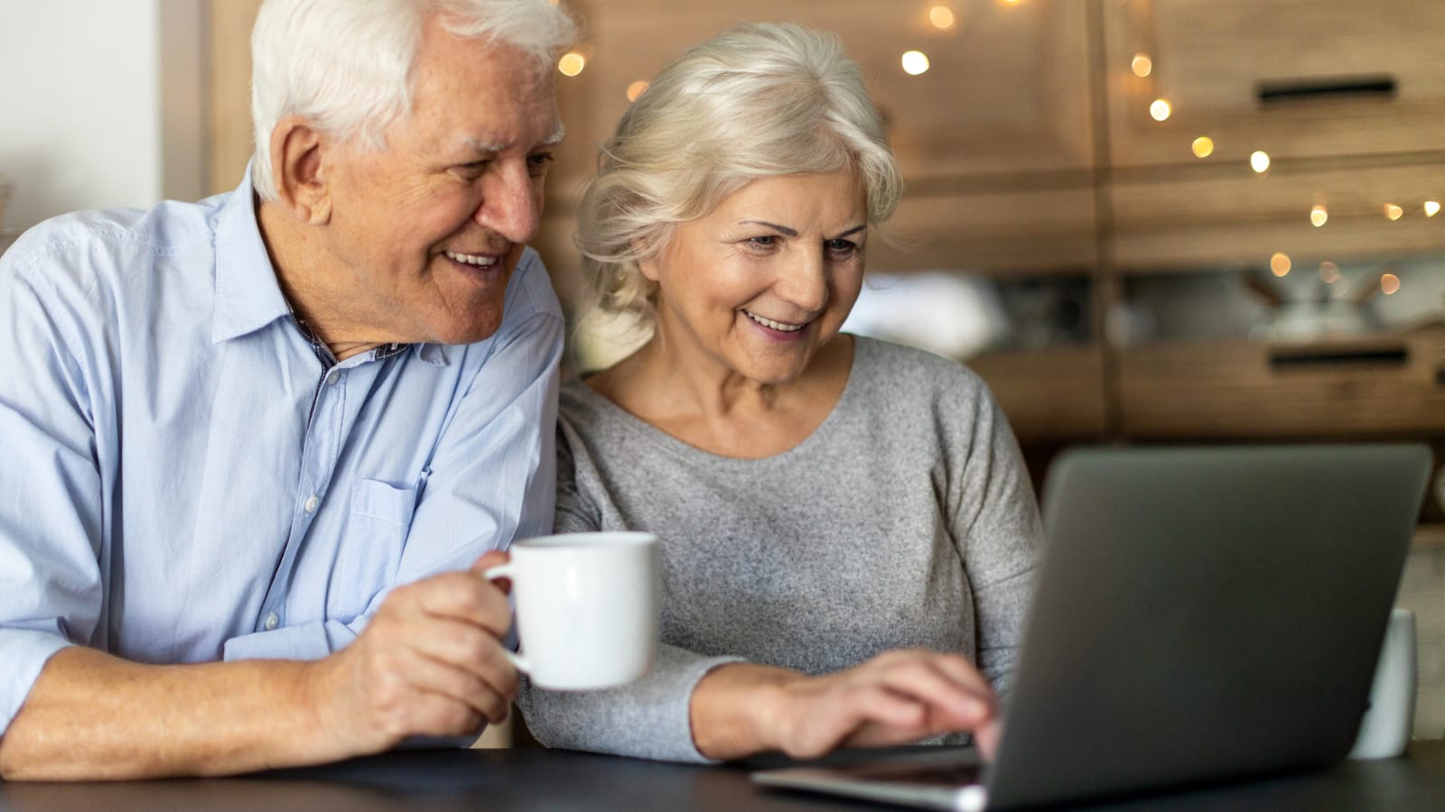 Retired couple reviewing their life insurance policies