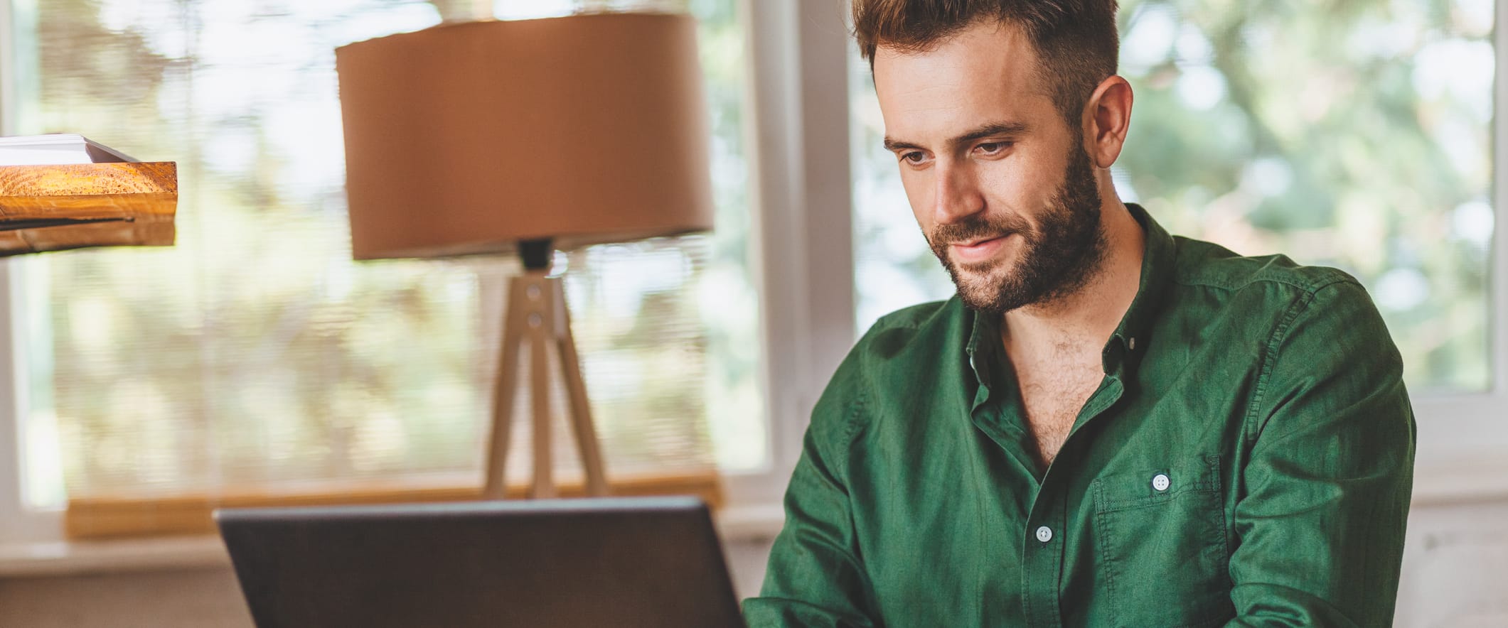 Young Man Working at Computer