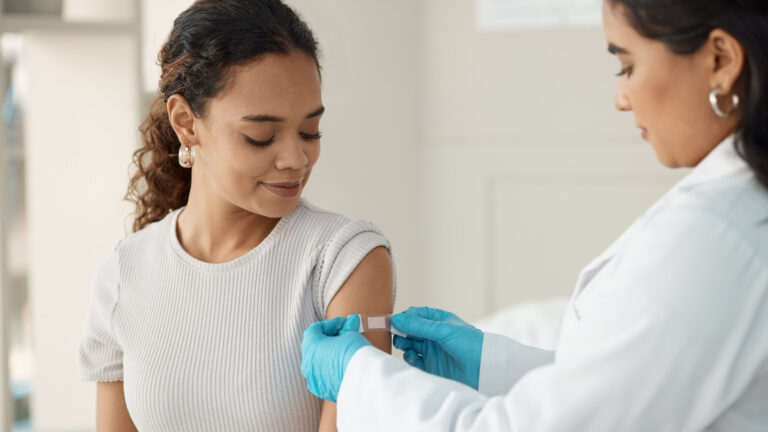 Woman just finished getting a shot