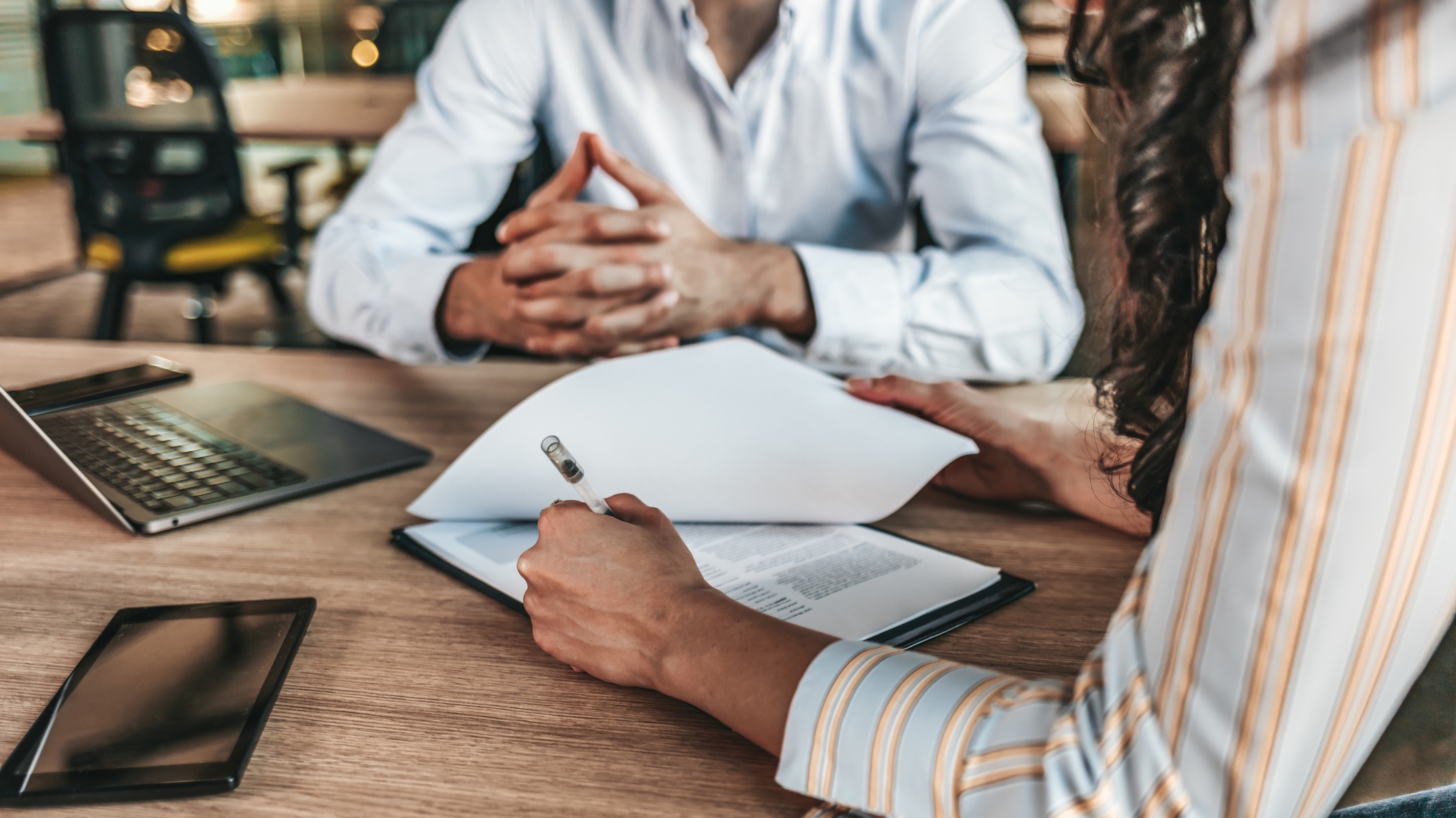 man and woman going over paperwork