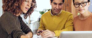 Couple discussing insurance with independent agent.