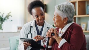 Senior woman speaking with her doctor