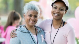 Woman and her mom celebrating surviving breast cancer